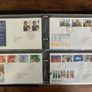 Collection of  81 UK First Day Cover stamps 1980 to 1986 in album plus 10 extra pages Image 7