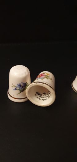 Collection of Flower Themed Gold Coloured Edged Thimbles