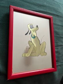 Small vintage Pluto mirror