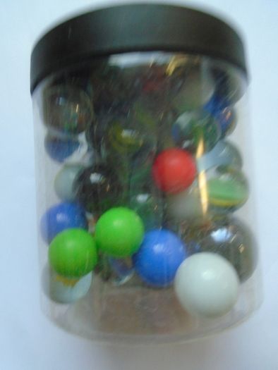 Jar of assorted marbles, Marbles.