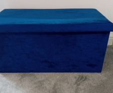 Blue throws cushions and storage box