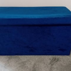Blue throws cushions and storage box
