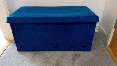 Blue throws cushions and storage box