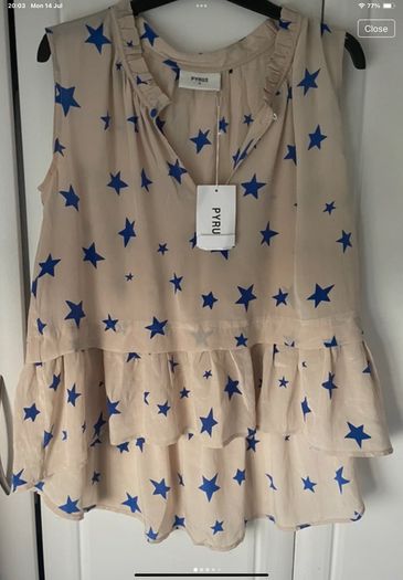 top bnwt 100% silk peplum top Pyrus brand cream with blue star pattern small