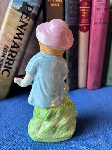 Vintage ceramic figurine of a young Boy Playing a Mandolin