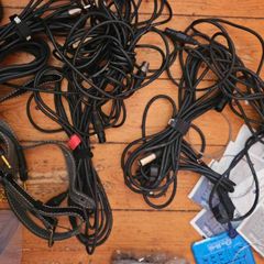 Bundle of Guitar Cables Strings and Musician Accessories