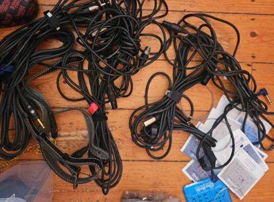 Bundle of Guitar Cables Strings and Musician Accessories