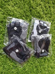 Gym gloves. Fingerless gloves. Cycling gloves. Work gloves. Carpenter gloves. Weightlifting. Workout.  Fitness.  Bodybuilding