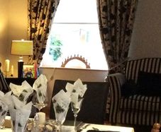 2 sets of matching Curtains and curtain poles