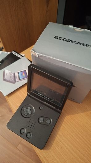 Gameboy Advance SP Boxed  , with two games.