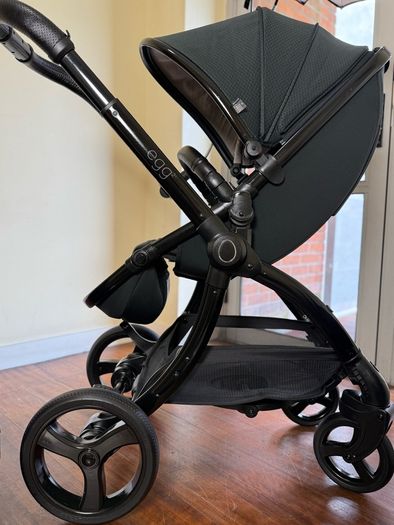 As New Egg2 travel system with Cybex car seat and isofix base swivel