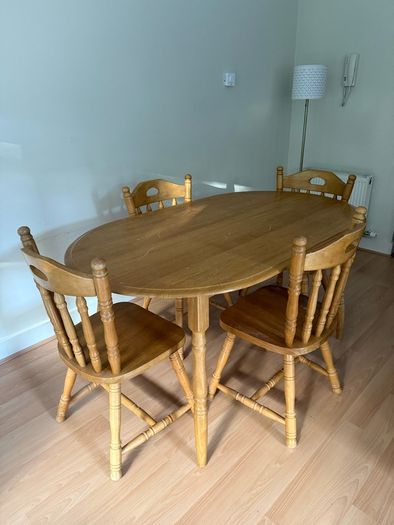 Sturdy wooden dining table and four chairs set