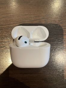 Left AirPod and case