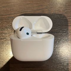 Left AirPod and case