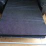 Black leather two-seater sofa-bed Image 4