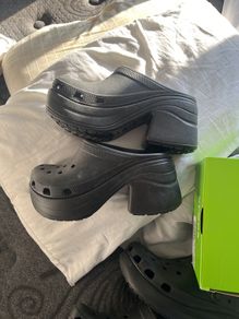 pair of black heeled crocs size 8