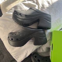 pair of black heeled crocs size 8