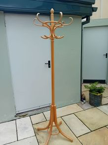 Wooden rotating coat stand