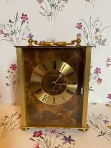 A vintage Staiger German quartz mantle clock. Height 5 inch 13cm. Width is 4 inch's 10cm