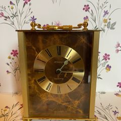 A vintage Staiger German quartz mantle clock. Height 5 inch 13cm. Width is 4 inch's 10cm