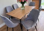 Extendable dining table with chairs on sale