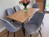 Extendable dining table with chairs on sale