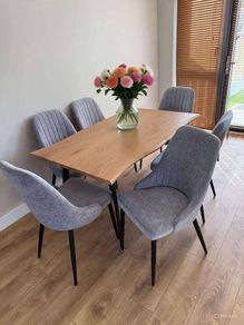 Extendable dining table with chairs on sale
