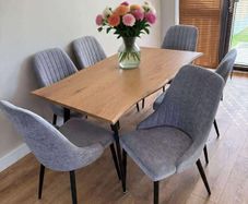 Extendable dining table with chairs on sale