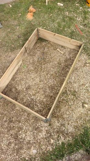 Wooden raised flower bed.