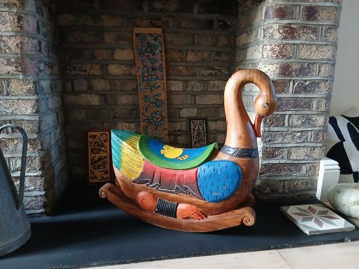 Hand carved rocking swan