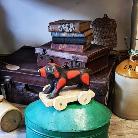 vintage wooden dog on wheels