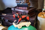 vintage wooden dog on wheels