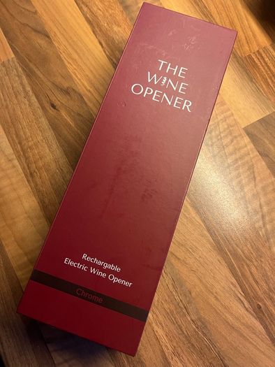 Brand new, never used rechargeable electric wine opener in original packaging.