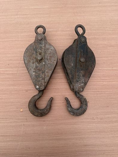 Pair of vintage pulleys