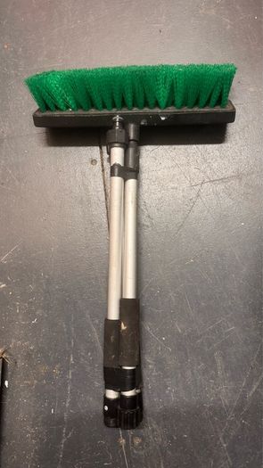 Telescopic water-fed cleaning brush