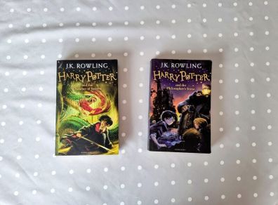 Harry Potter & the philosopher's stone paperback book and the Chamber Of Secrets