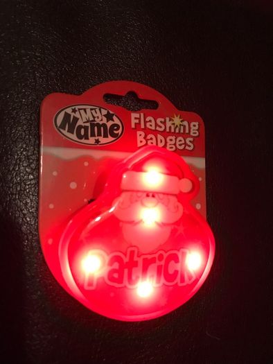 Christmas flashing badge named Patrick