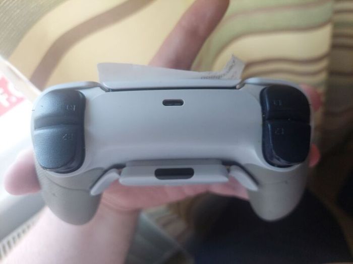 Ps5 dual sense edge controller with back buttons.