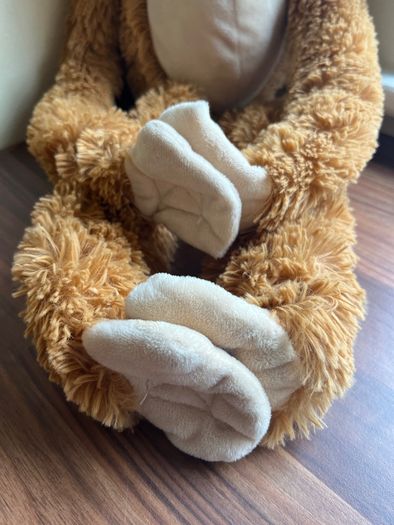 Light brown cheeky hanging Monkey
