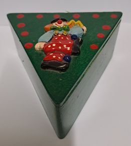 Vintage wooden box with clown
