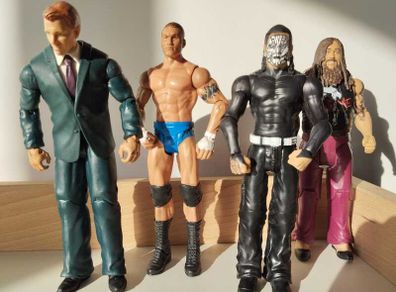 WWE Wrestling Action Figures  4 Figure Bundle