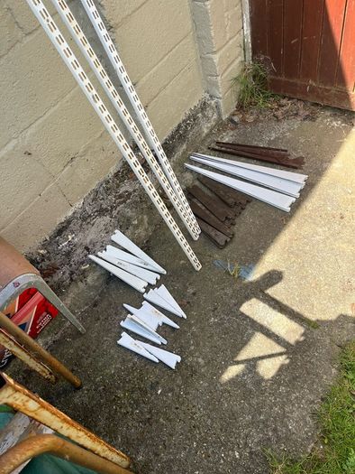 Adjustable shelving rails and brackets