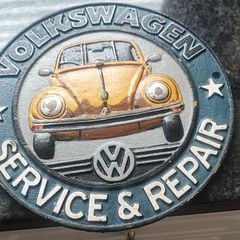 old cast iron sign