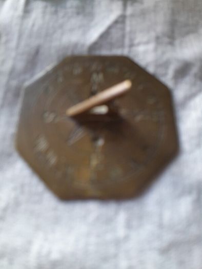 old miniature sundial