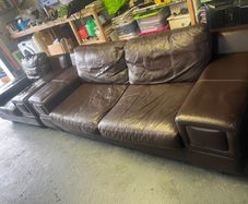 Brown leather sofa & armchair