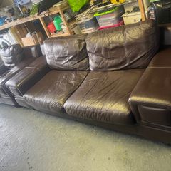 Brown leather sofa & armchair