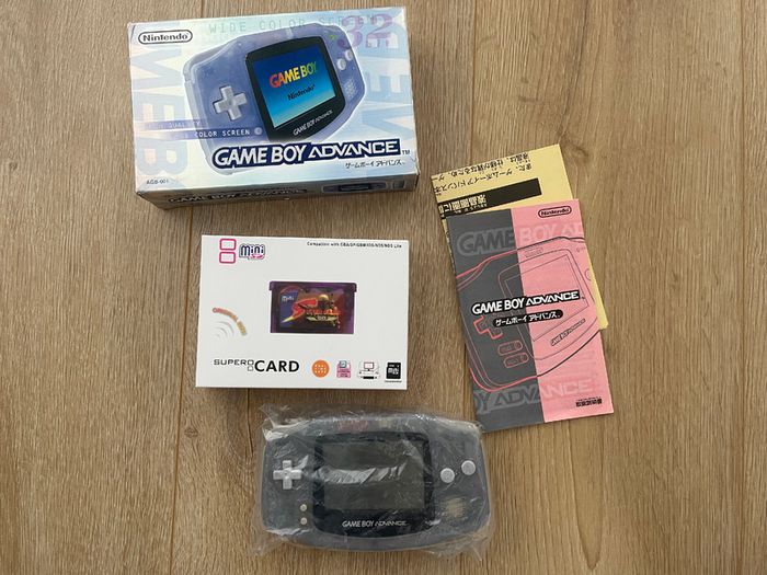 Nintendo Gameboy Advance AGB-001 Milky Blue Boxed with Manual and FlashCard 2GB