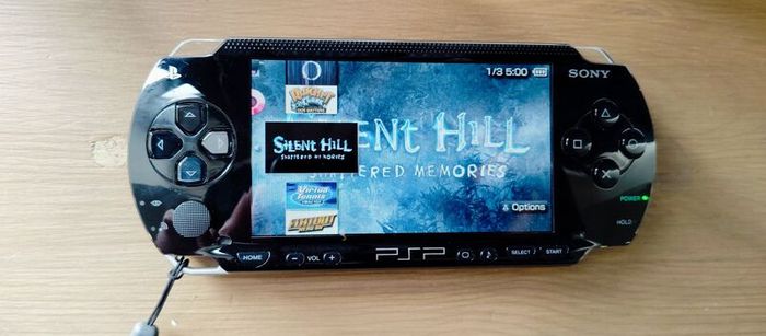 Psp 1000 Modded 64gb 40 psp original charger Excellent condition