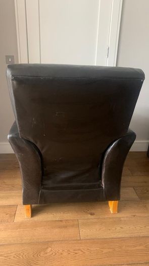 Bespoke solid armchair in need of repair