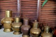Antique brass &amp; copper graduated collection of lidded dairy pitchers